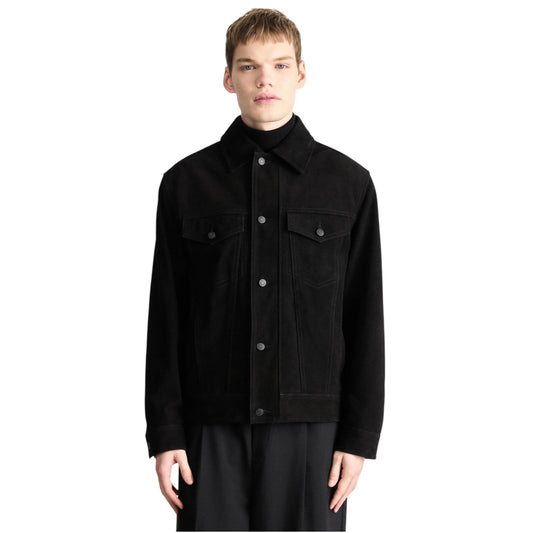 Person wearing a black jacket on a white background