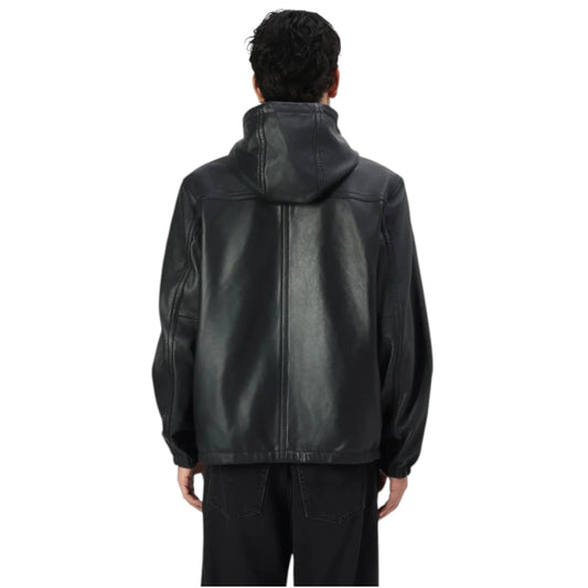 Person wearing a black leather jacket on a white background