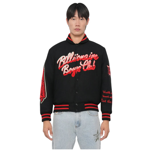 Person wearing a black and red 'Billions Boys Club' jacket on a white background